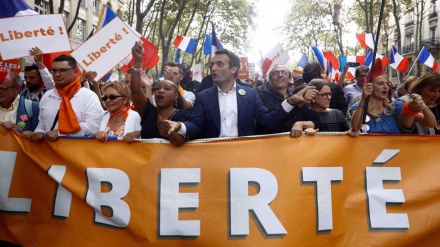 Demonstranten versammeln sich in Frankreich und Deutschland gegen verbindliche COVID-Regeln