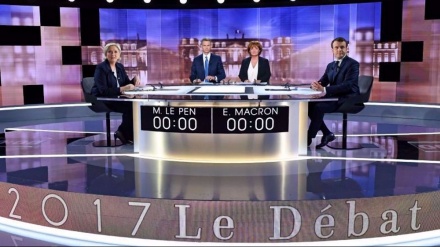 Konflikt zwischen Macron und Le Pen über Russland und muslimisches Kopftuchverbot in TV-Präsidentschaftsdebatte